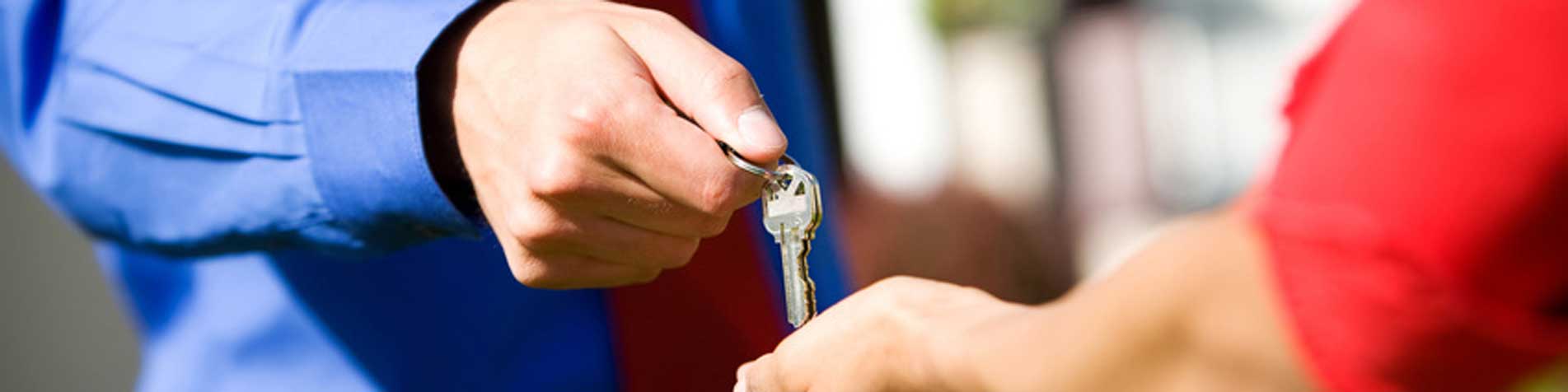 realtor handing over the keys